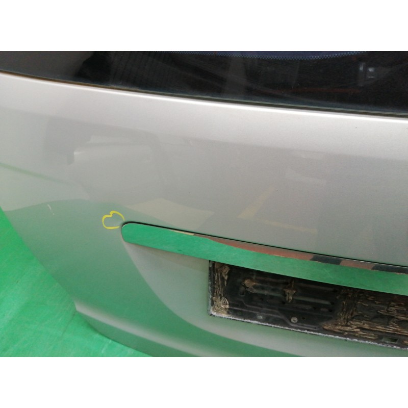 PORTON TRASERO NECESITA REPARACION