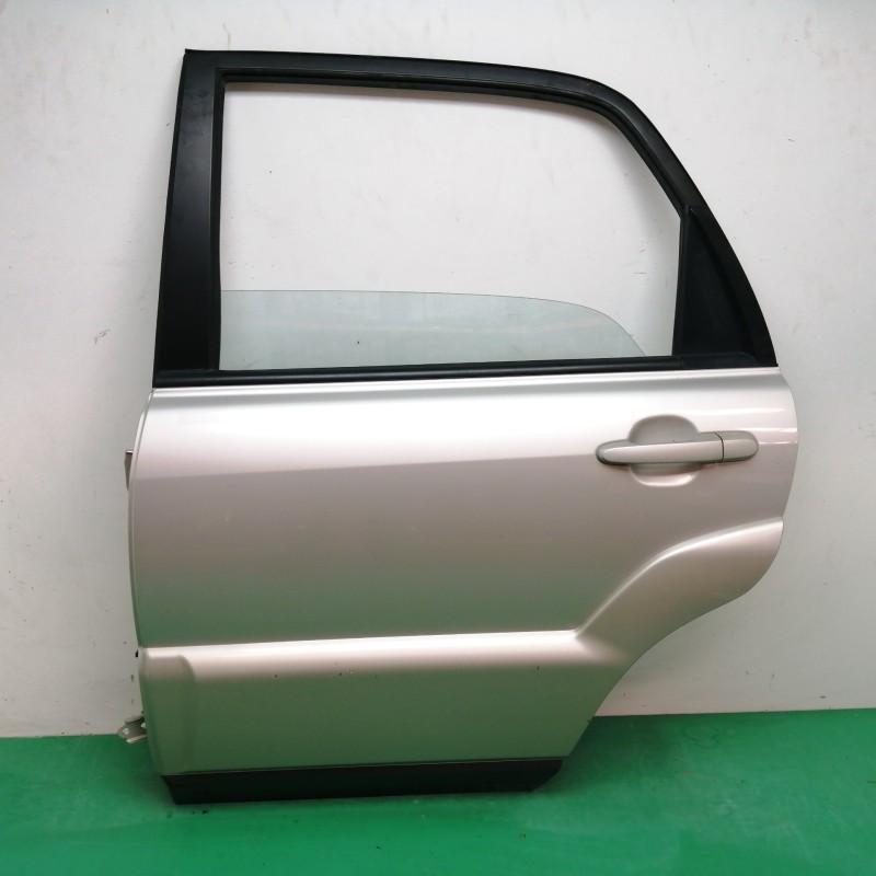Recambio de puerta trasera izquierda para kia sportage 2.0 turbodiesel cat referencia OEM IAM   
