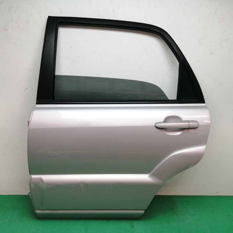 Recambio de puerta trasera izquierda para kia sportage 2.0 crdi referencia OEM IAM  OBSERVAR FOTOS 