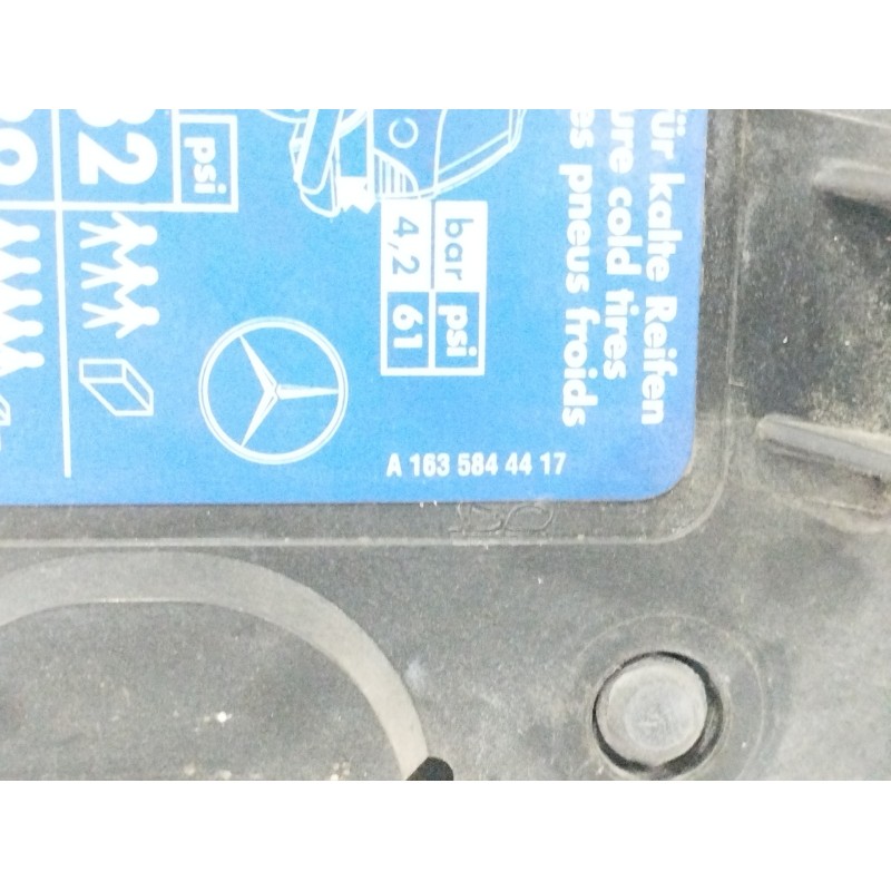 TAPA EXTERIOR COMBUSTIBLE