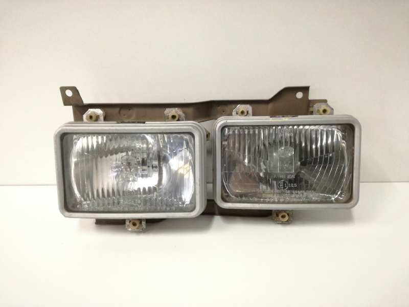 Recambio de faro izquierdo para nissan vanette (c 220) 2.0 diesel referencia OEM IAM   