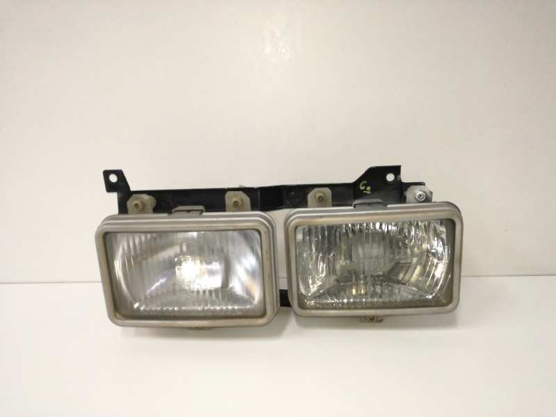 Recambio de faro izquierdo para nissan vanette (c 220) 2.0 diesel referencia OEM IAM   