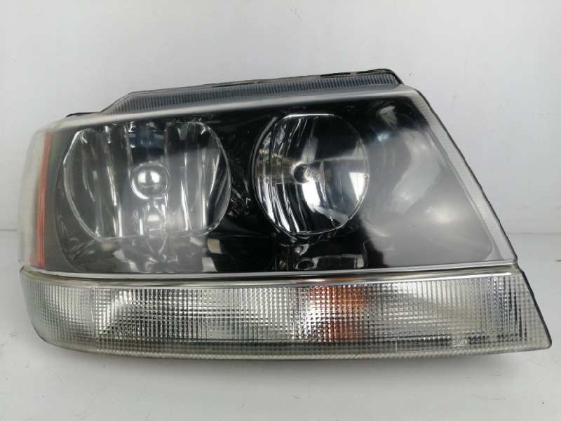 Recambio de faro derecho para jeep gr.cherokee (wj/wg) 2.7 crd cat referencia OEM IAM  OBSERVAR FOTO 