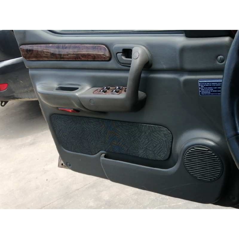 Recambio de guarnecido puerta delantera izquierda para ssangyong musso (fj) 2.9 td referencia OEM IAM   