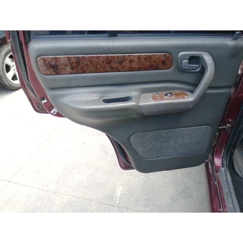 Recambio de guarnecido puerta trasera izquierda para ssangyong musso (fj) 2.9 td referencia OEM IAM   