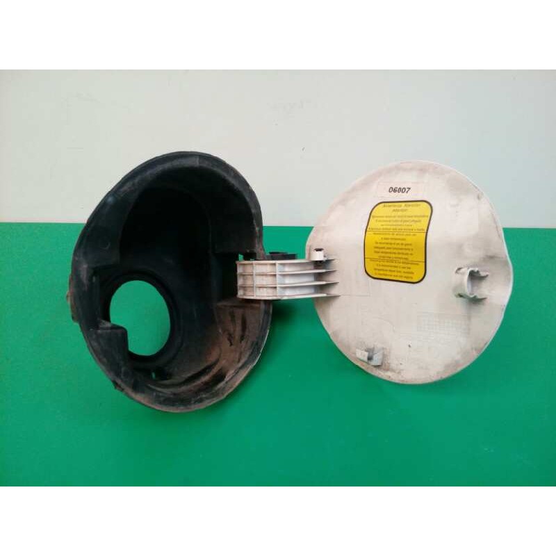 TAPA EXTERIOR COMBUSTIBLE