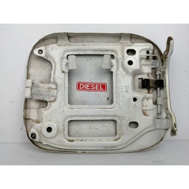 TAPA EXTERIOR COMBUSTIBLE