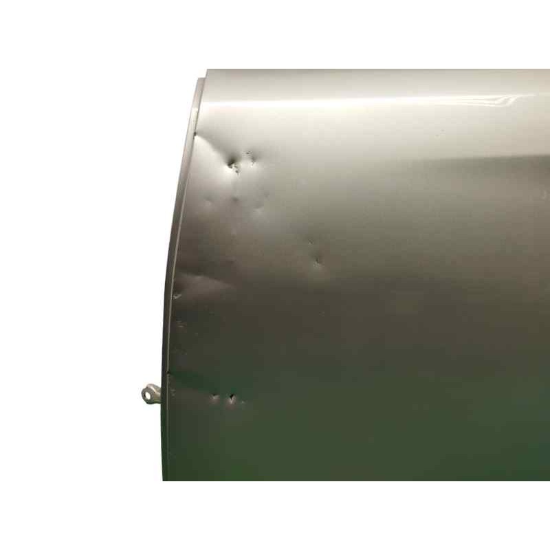 PUERTA TRASERA IZQUIERDA NECESITA REPARACION