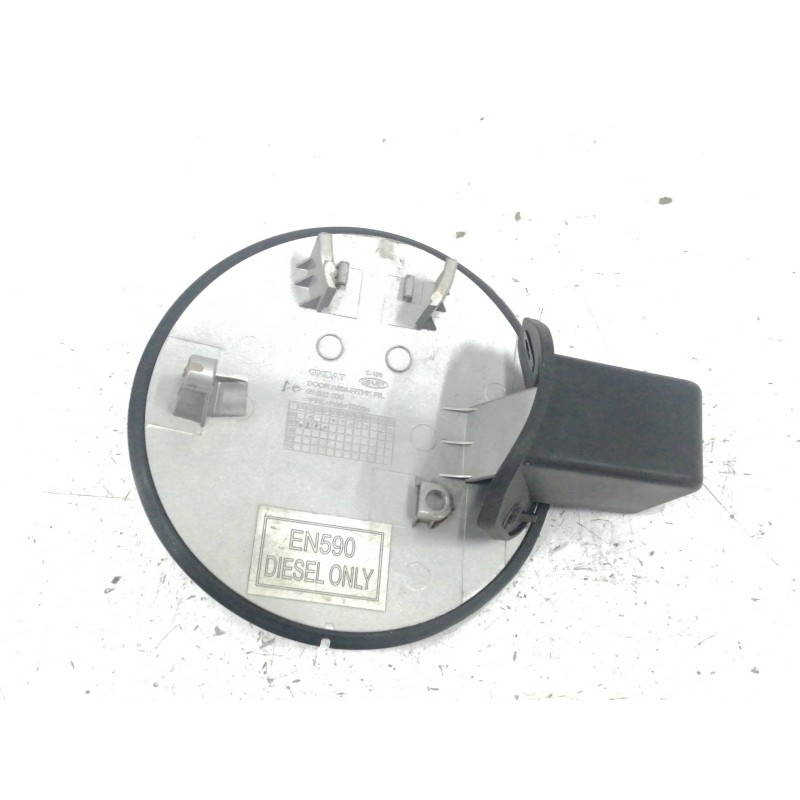 TAPA EXTERIOR COMBUSTIBLE