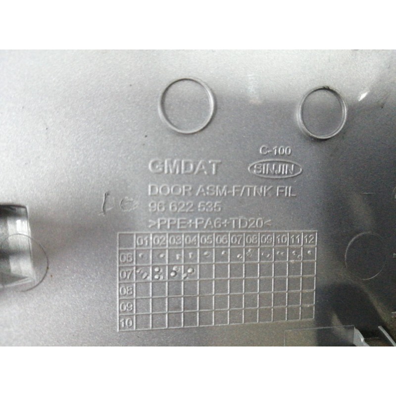TAPA EXTERIOR COMBUSTIBLE