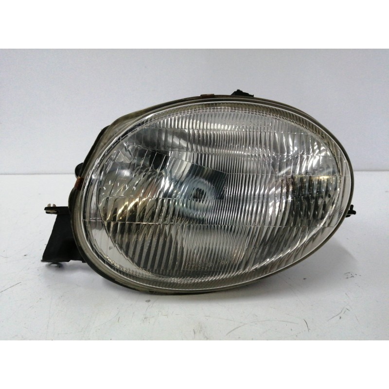 Recambio de faro izquierdo para toyota corolla (e11) 1.6 16v referencia OEM IAM 082121183L  