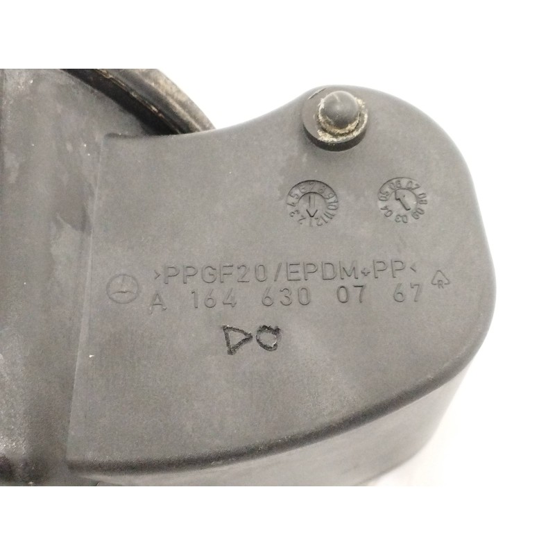 TAPA EXTERIOR COMBUSTIBLE