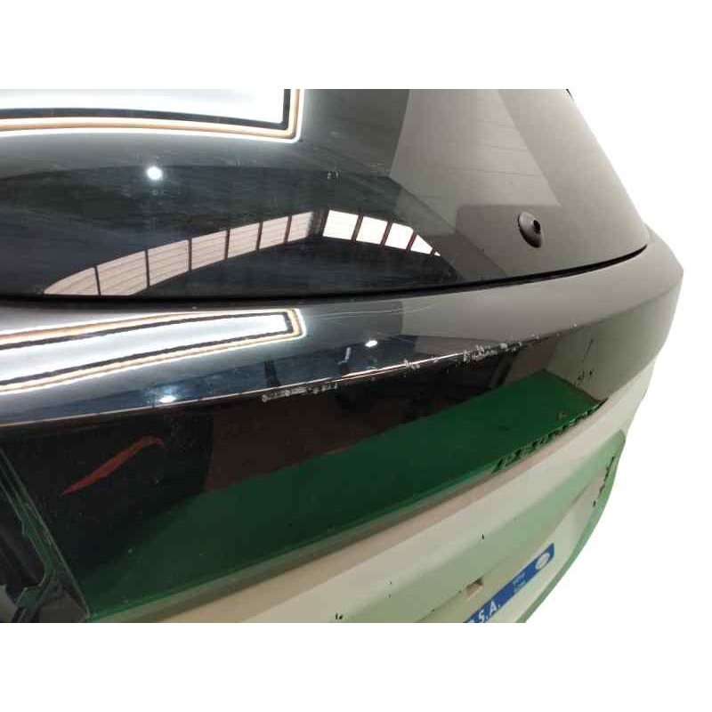 PORTON TRASERO NECESITA REPARACION