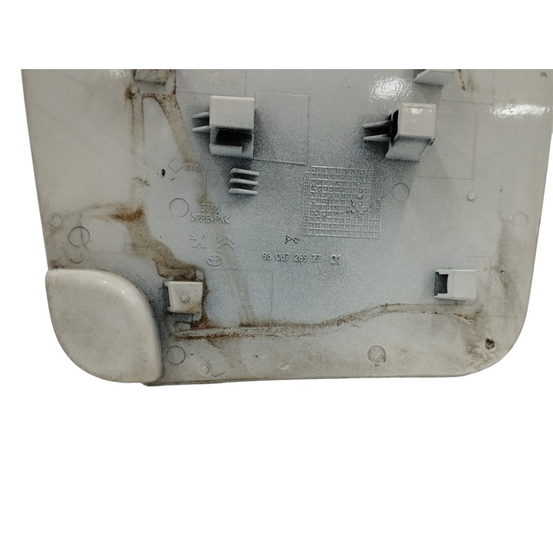 TAPA EXTERIOR COMBUSTIBLE