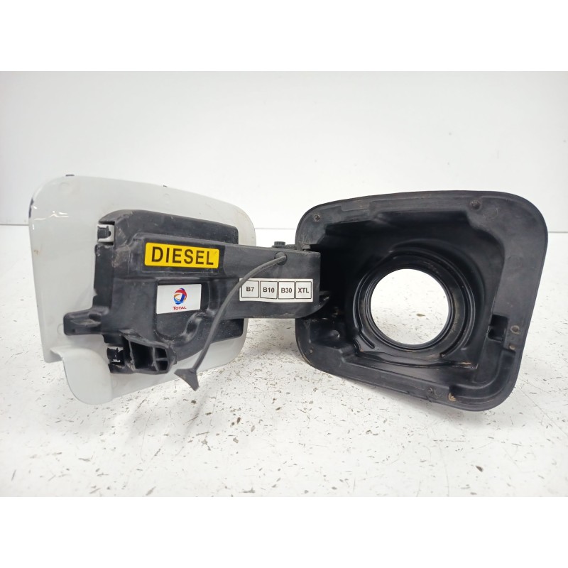 TAPA EXTERIOR COMBUSTIBLE