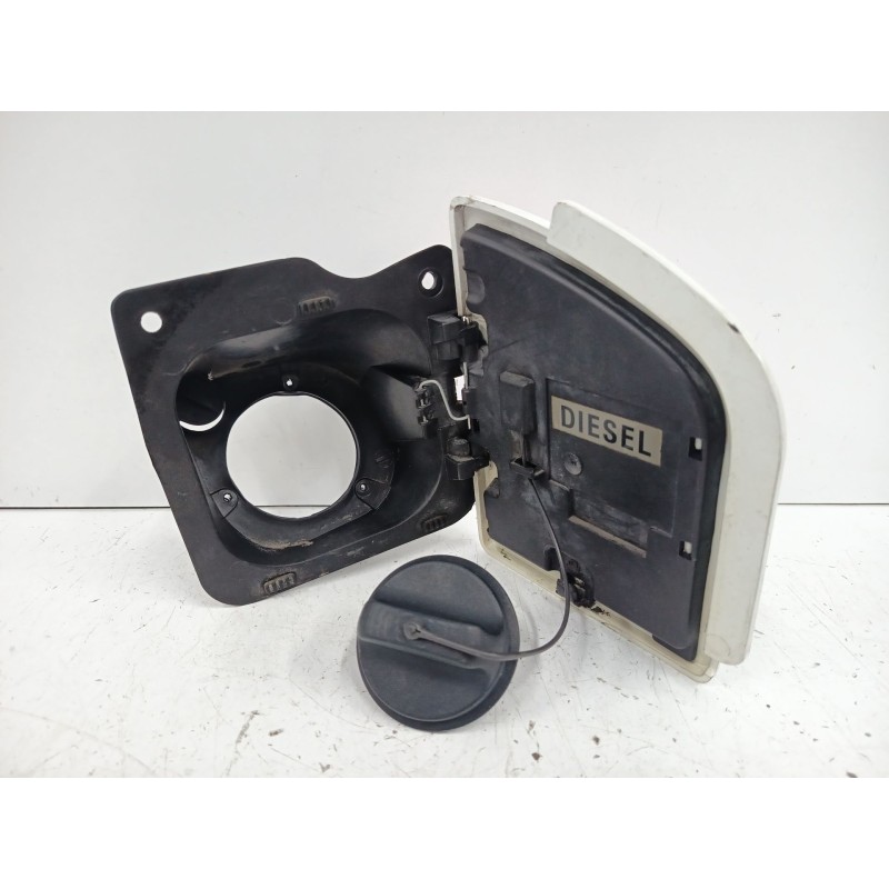 TAPA EXTERIOR COMBUSTIBLE