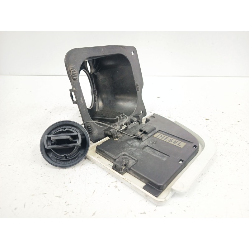 TAPA EXTERIOR COMBUSTIBLE