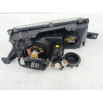 Recambio de faro izquierdo para ssangyong musso (fj) 2.9 td referencia OEM IAM 8310105300  
