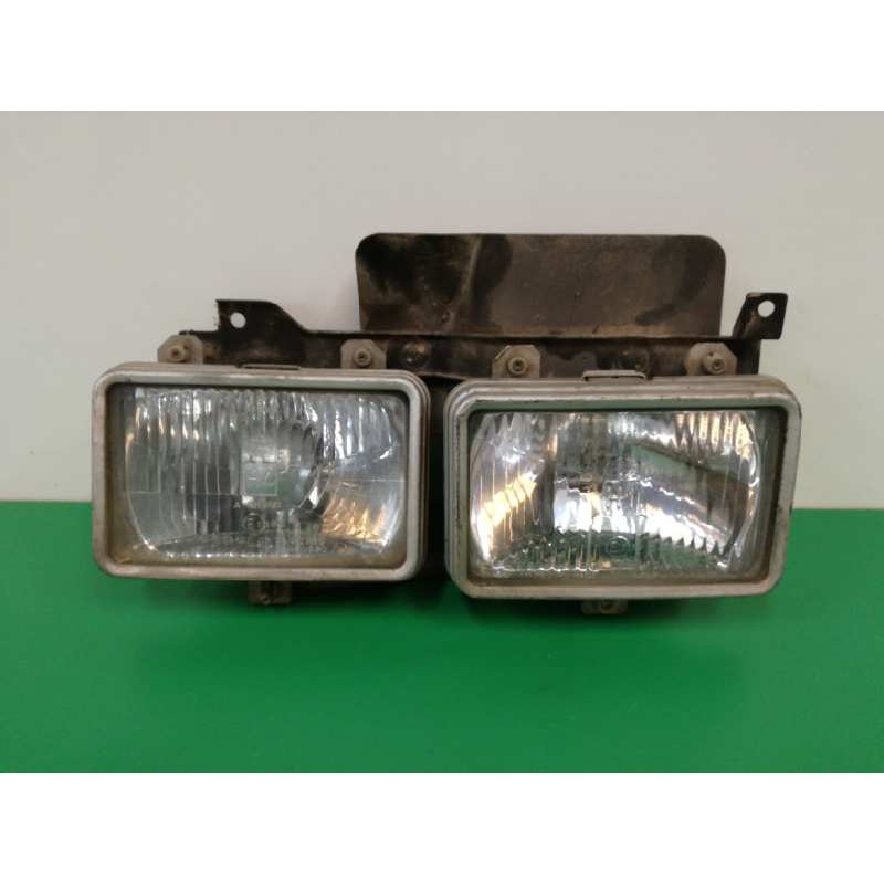 Recambio de faro derecho para nissan vanette (c 220) 2.0 diesel referencia OEM IAM   