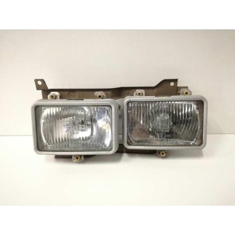 Recambio de faro izquierdo para nissan vanette (c 220) 2.0 diesel referencia OEM IAM   