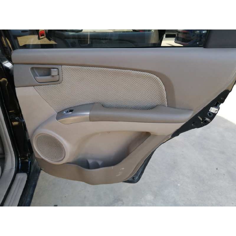 Recambio de guarnecido puerta trasera derecha para kia sportage 2.0 cat referencia OEM IAM   